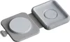 A light gray foldable wireless charger is shown open, revealing two circular indentations for charging devices. Anteprima dell’immagine prodotto