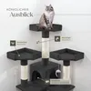 A cat tree with multiple levels and scratching posts, featuring hanging toys and cozy resting spots. Text overlays highlight product features. Náhled obrázku produktu