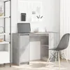 A desk with a laptop and chair in a room. Náhled obrázku produktu