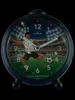 An alarm clock with a football player graphic on the face. Produktbild-Vorschau