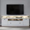 A white entertainment center with a television on top. Produktbild-Vorschau
