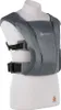 A baby carrier displayed on a mannequin. Produktbild-Vorschau