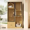 A multi-level cat furniture unit with various platforms, a house-shaped enclosure, scratching posts, and a litter box, set up in a room with natural light coming through blinds. Podgląd zdjęcia produktu