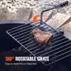 A steak is being grilled on a rotatable grate over a fire pit. Náhled obrázku produktu