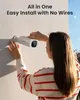 A woman is installing a white security camera on a wall. Náhled obrázku produktu