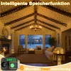A living room decorated with string lights on the ceiling and around the fireplace. Anteprima dell’immagine prodotto