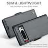 A close-up view of a black leather phone case, showing its texture and stitching. The case is open, revealing the back of a phone with a camera module. Text overlays highlight features like 'SLIM & LIGHTWEIGHT' and '2 mm Raised Edge Over Camera'. Produktbild-Vorschau