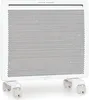 A white electric heater with a perforated front panel and wheels is shown against a white background. Produktbild-Vorschau