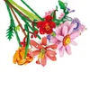 A close-up, overhead view of a bouquet of artificial flowers made from building blocks. Produktbild-Vorschau