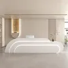 A modern reception desk in a clean, minimalist setting. Produktbild-Vorschau