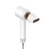 A white and tan hairdryer with a nozzle attachment is shown against a white background. Produktbild-Vorschau