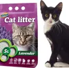 A bag of Hilton cat litter and a black and white kitten. Podgląd zdjęcia produktu