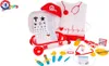 A collection of toy medical instruments laid out on a white background. Produktbild-Vorschau