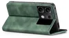 A green flip cover phone case is shown from the side, propped open to reveal the phone's camera module. Produktbild-Vorschau