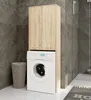 A washing machine with a cabinet above it in a bathroom. Anteprima dell’immagine prodotto