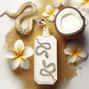 A perfume bottle is displayed with decorative elements like snakes, flowers, and a coconut. Anteprima dell’immagine prodotto