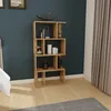 A wooden bookshelf with decorative items in a room with a dark blue wall and curtains. Produktbild-Vorschau