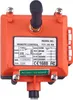 An orange industrial remote control with a label showing its model number, specifications, and wiring diagram. Náhled obrázku produktu