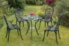 A garden table and four chairs set in a garden setting. Náhled obrázku produktu