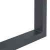 A close-up view of a black metal table leg corner. Voir les images du produit