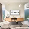 A modern living room with a TV mounted on the wall above a wooden media console. Anteprima dell’immagine prodotto