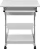 A white computer desk with two shelves and wheels, shown from the front on a white background. Náhľad obrázku produktu