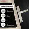 A door handle set with included accessories displayed on a dark background. Produktbild-Vorschau