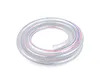 A coiled clear hose with red and blue stripes on a white background. Anteprima dell’immagine prodotto