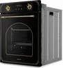 A black built-in oven with gold accents and a silver metal casing on the right side, shown from a three-quarter angle against a white background. Podgląd zdjęcia produktu