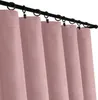 Several pink curtains hanging from a black curtain rod. Podgląd zdjęcia produktu