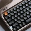 A close-up view of a Lofree mechanical keyboard with retro-style round keys. Produktbild-Vorschau