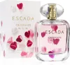 A bottle of Escada Celebrate N.O.W. Eau de Parfum for Women and its packaging are displayed side-by-side against a white background. Produktbild-Vorschau