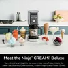 A kitchen counter with a Ninja CREAMi Deluxe ice cream maker and various frozen desserts. Podgląd zdjęcia produktu