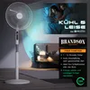 A split image showing a white standing fan on the left and a couple sleeping in bed on the right, with promotional text overlays. Voir les images du produit
