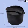 A black rice cooker with a lid and a spatula resting on top, with dimensions indicated. Text about availability in colors is present. Produktbild-Vorschau