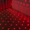 Red LED net lights are draped across a floor and up a wall, casting a warm glow. Produktbild-Vorschau