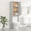 A modern bathroom scene with a toilet and a tall cabinet above it, along with a vanity and a mirror. Produktbild-Vorschau