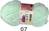 A ball of light green yarn on a white background. Náhľad obrázku produktu