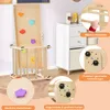 A child's wooden climbing set with various accessories and features highlighted with text overlays. Podgląd zdjęcia produktu