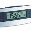 A close-up shot of a digital alarm clock displaying the time and alarm settings. Anteprima dell’immagine prodotto