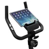 A close-up view of the handlebars and tablet holder of a stationary exercise bike. Produktbild-Vorschau
