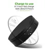 A black rotating display stand with text overlay about its charging capabilities. Náhled obrázku produktu