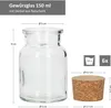 A clear glass spice jar with dimensions and a cork stopper are shown with measurement indicators. Podgląd zdjęcia produktu