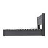 A side view of a gray upholstered bed frame with a tufted headboard and a slatted mattress base, isolated on a white background. Voir les images du produit
