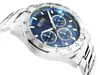 A close-up, angled shot of a Hugo Boss chronograph watch with a blue dial and silver metal band, set against a white background. Produktbild-Vorschau