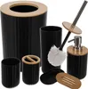 A collection of black bathroom accessories with bamboo accents, including a trash can, soap dispenser, toilet brush, soap dish, toothbrush holder, and cup. Voir les images du produit