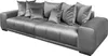 A large, modern gray sofa with multiple throw pillows. Produktbild-Vorschau