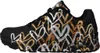 A side view of a black sneaker with a metallic heart pattern. Anteprima dell’immagine prodotto
