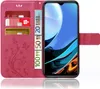 A pink flip phone case with card slots and a phone inside. Produktbild-Vorschau