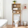 A bathroom scene with a toilet and a storage unit above it. Produktbild-Vorschau